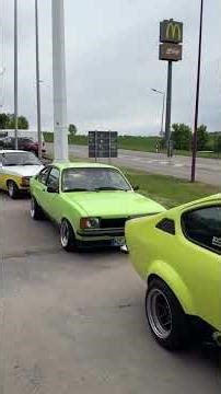 Opel Kadett C meeting on gas station