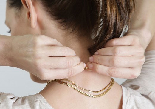 The Old-School Trick That Keeps Your Necklace From Sliding All Day