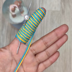 2.1K views · 18 reactions | How to make a beautiful thread flower easily using your finger | Knitting Fashion | Facebook