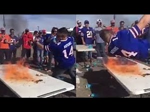 Buffalo Bills Fans Jumping Flaming Table,breaking His Leg Through A Folding Table