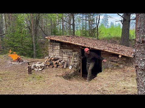 Building a secret underground shelter from an old abandoned bunker. Bushcraft in the wild.