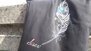 Revamp an old t-shirt with Siser Holographic 💎 This Heat Transfer Vinyl catches the light and changes colours as you move. And it's just gorgeous 🤩 Can we just put this on everything? | Siser