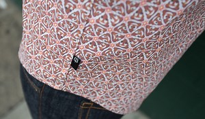 A Classy Button-Up Shirt and High-Top Sneakers Covered in Poop Emoji