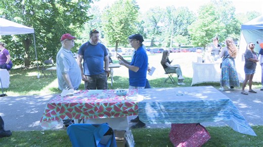 People gather at the Rochester Deaf Festival at Genesee Valley Park
