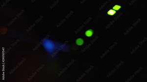 defocussed concept shot shot of blinking blue and green LED lights