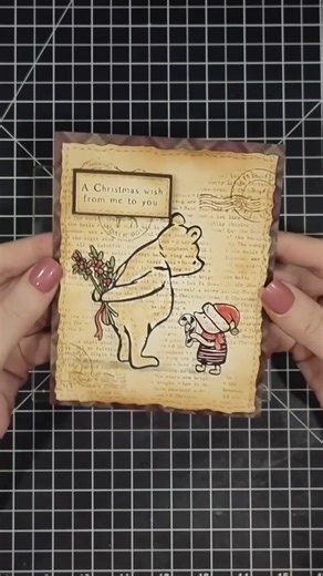 🐻🎄 Merry making with Winnie the Pooh never looked sweeter! This charming card brings all the storybook feels — soft Distress Ink watercoloring, layered stamps, and a dash of holiday whimsy straight from the Hundred Acre Wood. 🍯✨ Every element tells a tale, from the cozy carol background to the sweet postage marks and plaid layers. Perfect for spreading a little handmade cheer! 💌 Featured Products: ✦ Winnie the Pooh: Holiday Exchange – our star with all the heart. ✦ A Little Christmas Carol –