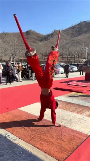 The Impressive Stilt Walker: Mastering 4 Flips in a Row! Watch Now