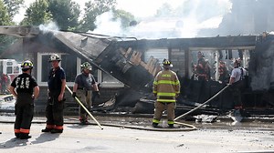 Fire destroys Dover restaurant, apartments; firefighter injured