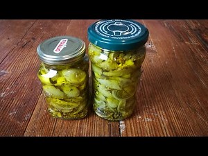 Green tomatoes under oil
