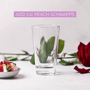 1.4K views | Love at first sip! This sweet + fruity Love Martini is perfect for a Valentine’s Day celebration.  Here's what you'll need: 1 ounce Peach Schnapps ☑️ 1 ounce Vodka ☑️ 3 ounces Cranberry Juice ☑️ Strawberries for garnish ☑️ What's your favourite Valentine's Day cocktail? Drop your suggestions in the comments  | Bar + Block | Facebook