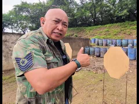 SHOOTING A REVOLVER THROUGH A JACKET POCKET