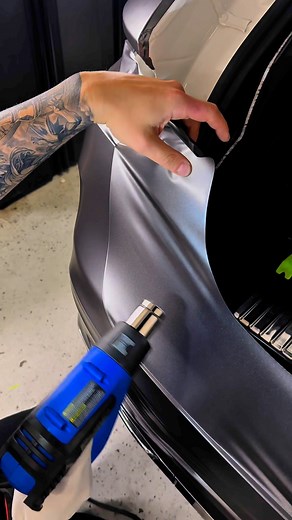 169K views · 2.5K reactions | Finishing up intricate details to perfection on this Rear Bumper wrap in 3M satin Dark Grey. Can anyone guess the car? | Wrap Meisters | Facebook