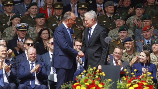 Germany's Merz inaugurates new brigade in Lithuania, saying Russia 'is a threat to us all'