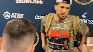 Dillon the Villain had to make sure he cut through Devin Booker's post-game interview. 😅 (🎥: GeraldBourguet/X) | theScore