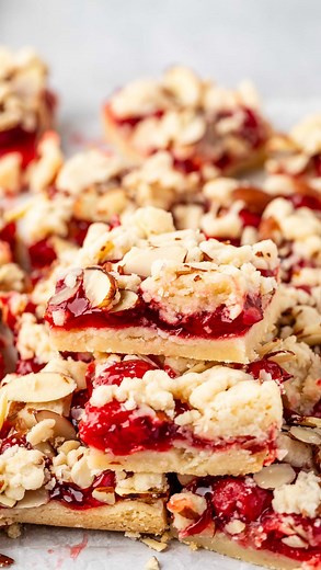 Dorothy Kern | @crazyforcrust on Instagram: "UPDATED! ✨ Cherry Pie Bars with a shortbread crust - you take have that dough and sprinkle in almonds for a crumble topping. Use canned or my homemade recipe for cherry pie filling inside!⁠ Comment LINKS and I’ll send you the link to the recipe!⁠ ⁠ You can also find the recipe link in my bio or find it online here: https://www.crazyforcrust.com/almond-chocolate-cherry-pie-bars/⁠ ⁠ #recipe #dessert #cherry #pie #bars"