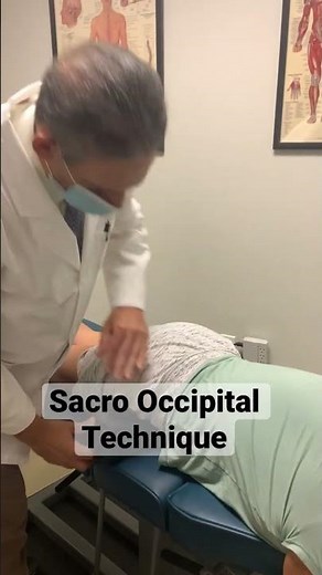 He balances her feet and hips. Sacro Occipital Technique can reduce pain.