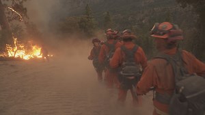 For $1 an hour, thousands of California inmates help battle the state's massive wildfires