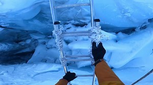 Early morning ladder crossing in the Khumbu Icefall. | Elia Saikaly