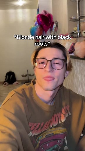 Blonde Hair with Black Roots: Stylish Transitions