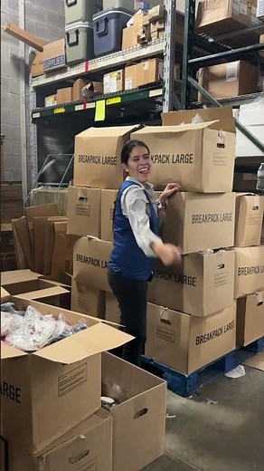 Fashion associate in Walmart working in the back