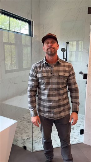 HD Builders / Custom Home Builders on Instagram: "Stepping into a custom shower like this is a game-changer. This zero-entry design features beautiful tile selected by our homeowners, custom niches, and a sleek glass layout that truly brings the space to life. Our process is simple and intentional — you’ll meet with one of our trusted vendors and a design professional to select all your tile for the home, including your shower layout. During our walkthrough together, we’ll talk through niche loc