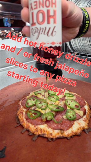This is your sign to spice things up. 🔥 Hot honey drizzle fresh jalapeños = next-level pizza. Add it to any pie, starting today. 👉 Order online or stop in #HotHoney #JalapeñoLove #PizzaReel #WildRiver #SpicyPizza#spicypizza🍕 | Wild River Pizza co Pizza Deli