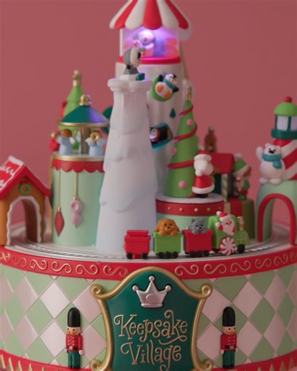 Welcome to your happy place! Created by Keepsake Artists Sharon Visker and Emma Leturgez-Smith, our new Keepsake Village ornament lights up, moves and plays a medley of Christmas carols. 🤩🎄 Featuring beloved characters from your favorite series, it's a must-have for every merrymaker. Bring it home at Ornament Premiere in July! In the meantime, add this to your Wish List here: https://bit.ly/4m7Z2jk. | Hallmark Keepsake Ornaments