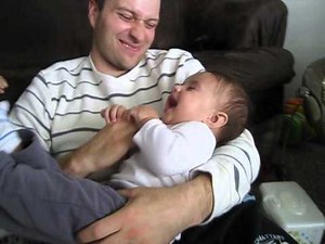 Declan giggles and tickles