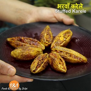 5.6M views · 23K reactions | बिना Deep Fry किये भरवाँ करेले बनाने का सही तरीका - Stuffed Karela (Bitter Gourd) Recipe #FoodsAndFlavors #RecipesByShilpi #Dinner #Lunch #Sabji #Recipe #IndianRecipes #Cooking | Foods And Flavors | Facebook