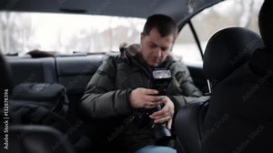 tourist rides in taxis. The man in the taxi puts flash on your camera