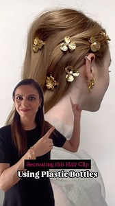 DIY Statement Golden Hair Clip Using Plastic Bottles ✨♻️ 1. Cut the plastic bottle, flatten it into a sheet, and cut out a flower shape. 2. Use a candle flame to slightly heat the edges, giving them a natural 3D curve. 3. Apply golden flakes for a luxe, shimmering effect. 4. Glue a white pearl in the middle to complete the flower design. 5. Secure the flower onto a hair clip base, and it’s ready to wear! And just like that, you have a stunning, sustainable accessory! Would you try this? 💛♻️ . .