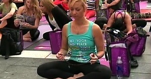 Mass solstice Yoga class in NYC's Times Square