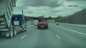 Video shows dump truck with raised bed slamming into bridge