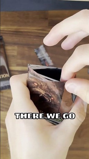 opening up the official inscryption card pack