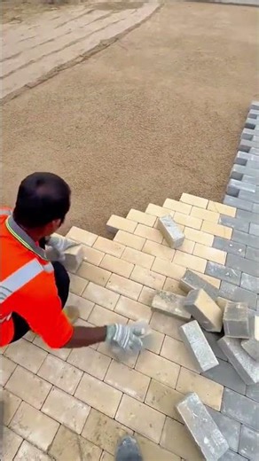 The Process of Installing Brick Pattern Paving Blocks for a Neat and Strong Road Surface #shorts