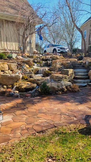 💦 Yes, this can be in your yard! Whether you're dreaming of a peaceful backyard retreat or an eye-catching showpiece, we create custom waterfalls that bring beauty, sound, and serenity to your space. Curious what’s possible at your place? Let’s chat! Hashtags: #BackyardWaterfall #WaterFeatureGoals #aquascape #PondKingCreations #OutdoorOasis #SoothingSounds #WaterfallDesign #MinnesotaLandscaping #YardGoals #NatureInspired #GardenVibes #PeacefulBackyard #OutdoorLiving | Pond King Water Gardens