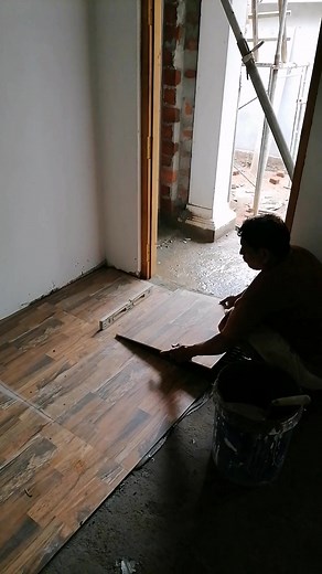 35K views · 202 reactions | Kitchen Floor Tiling in Progress ️隣 Just look at that finish!  These 600mm x 600mm tiles are designed to give a natural timber floor look—warm, elegant, and super stylish! Perfect blend of modern utility and timeless design.  How’s the vibe? #KitchenFloorTiling #TileInstallation #TimberLookTiles #ModernFlooring #InteriorDesign #SiteWorkUpdate #TileWork #PiumalPathirana #EngPiumalPathirana | Eng. Piumal Pathirana | Facebook