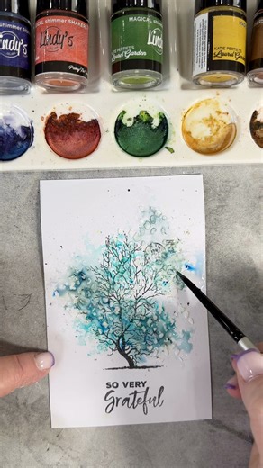 Sprinkle the Magic! It’s easy with Magicals from @lindysgang and my bare tree stamp from the Winter Etchings designed for @ardencreativestudio Stamp the tree and the sentiment [from one of my older retired stamps designed for Simple Stories] in archival ink and then I added some texture paste with my Distressed Diamond Stencil designed for @ardencreativestudio. Followed up with a sprinkle of magicals [Cuppa Teal and Dunka Biscuit Blue], spritz with water and watch the magic happen! I grabbed a s