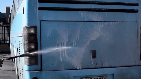 Power Washing A Large Blue Bus With Expert Techniques