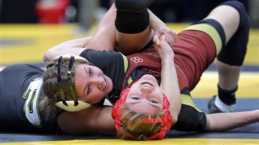 Perry girls wrestler Emma Shephard records a pin in a recent dual match against Northwest