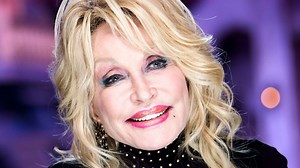 'It's always #HotGirlSummer': Dolly Parton dresses up as a Playboy bunny for husband's birthday