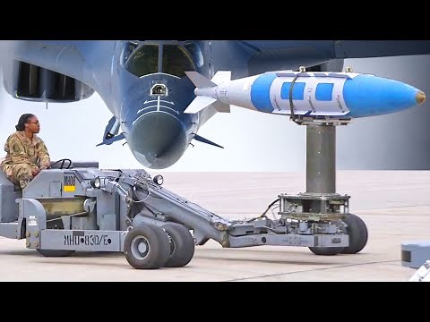 Air Force Weapons Loaders Arm US B-1 Lancer Aircraft