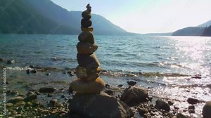 Balancing Rocks on the beach by the Alouette Lake during a sunny winter day. Taken in Golden Ears Provincial Park, near Vancouver, British Columbia, Canada.