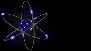 Blue stylized atom and electron orbits. Scientific motion background with free space for inscriptions. Nuclear, physics, atomic, science concepts. 4K seamless loop animation