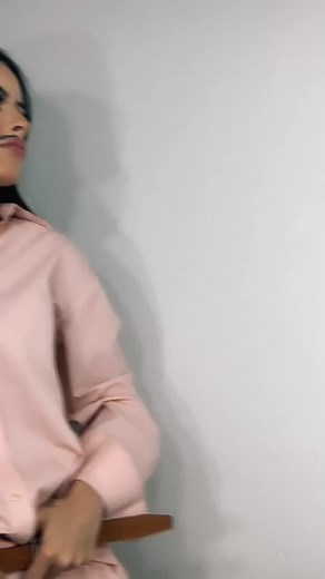 Stylish Gesture Demonstration in Light Pink Attire