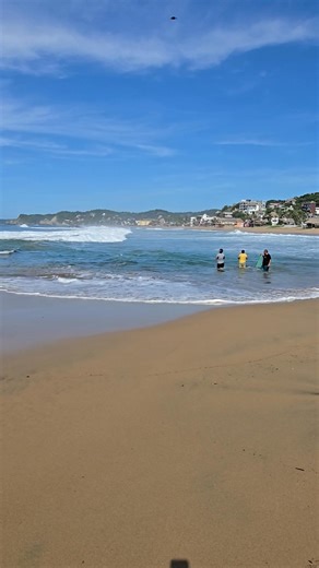 East end of the beach with people and Mr. Heron fishing. | Billy Carter