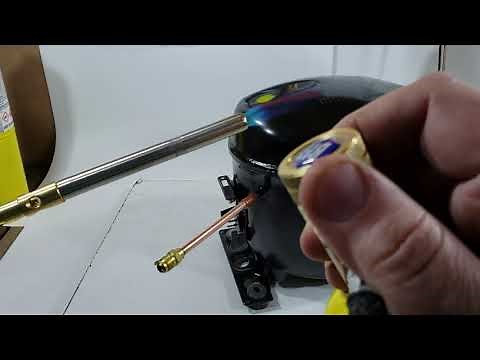How to solder a service valve on a family refrigerator compressor using a Bellini gas Mapp torch.