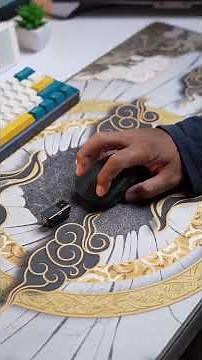 100 thousand gaming mouse now has a screen and uses a Pixart sensor?