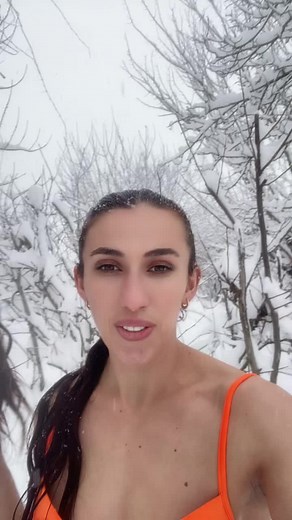 Enjoying a Snowy Day in Swimsuits