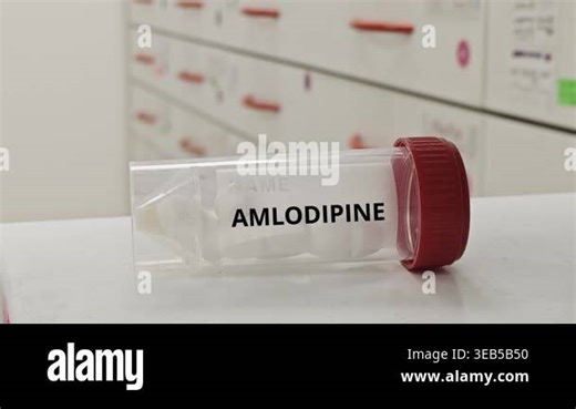 AMLODIPINE tablets used to treat hypertension and angina a calcium channel blocker Stock Video Footage - Alamy